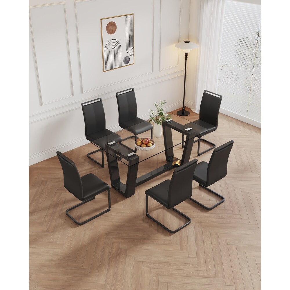 Table and chair set  1 table with 4 black chairs. 0.4 \