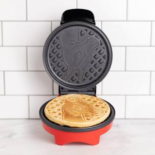 Uncanny Brands Pokemon 600 W Black 'Charizard' Round American Waffle Maker WM1-POK-CHZ