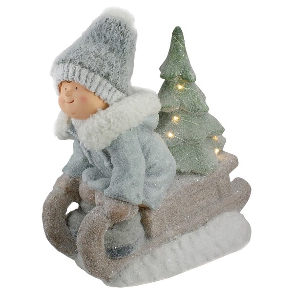 Lighted Boy on a Sled with Tree Christmas Decoration