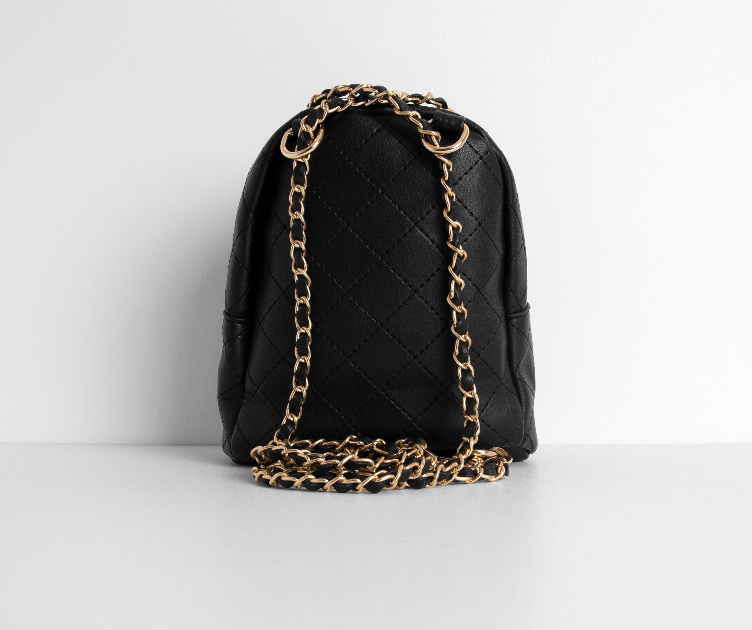 Day To Night Quilted Chain Backpack