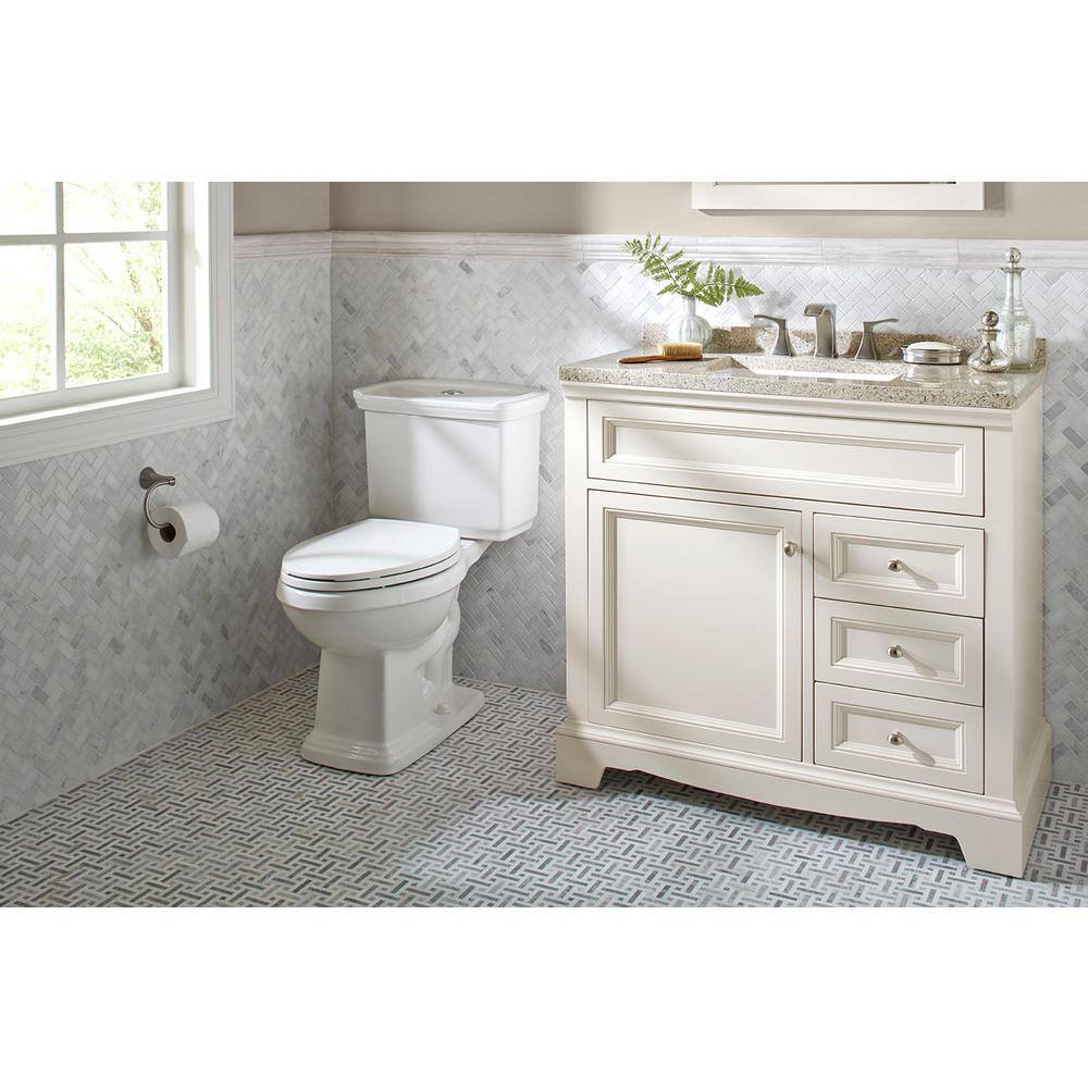 Glacier Bay 2-piece 1.0 GPF1.28 GPF High Efficiency Dual Flush Elongated Toilet in White N2430E