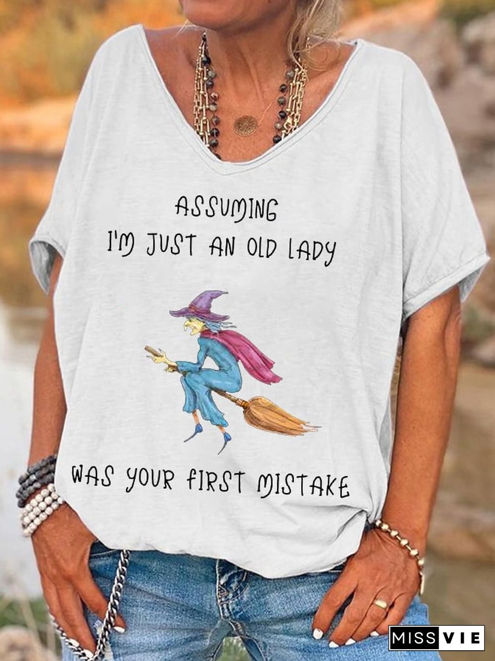 Women's Funny Witch Assuming I'm Just An Old Lady Was Your First Mistake Halloween V-Neck Tee