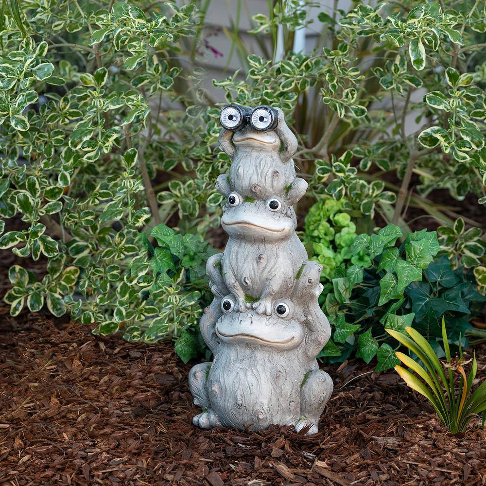 Alpine Corporation 23 in. Tall Outdoor Solar Powered Stacked Frog Family Statue with LED Lights QWR848SLR