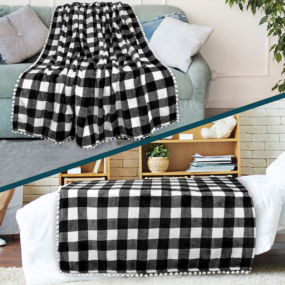 PAVILIA Fleece Throw Blanket with Pom Pom Fringe | Buffalo Plaid Checkered White， Black Flannel Throw | Super Soft Lightweight Microfiber Polyester | Plush， Fuzzy， Cozy | 50 x 60 Inches