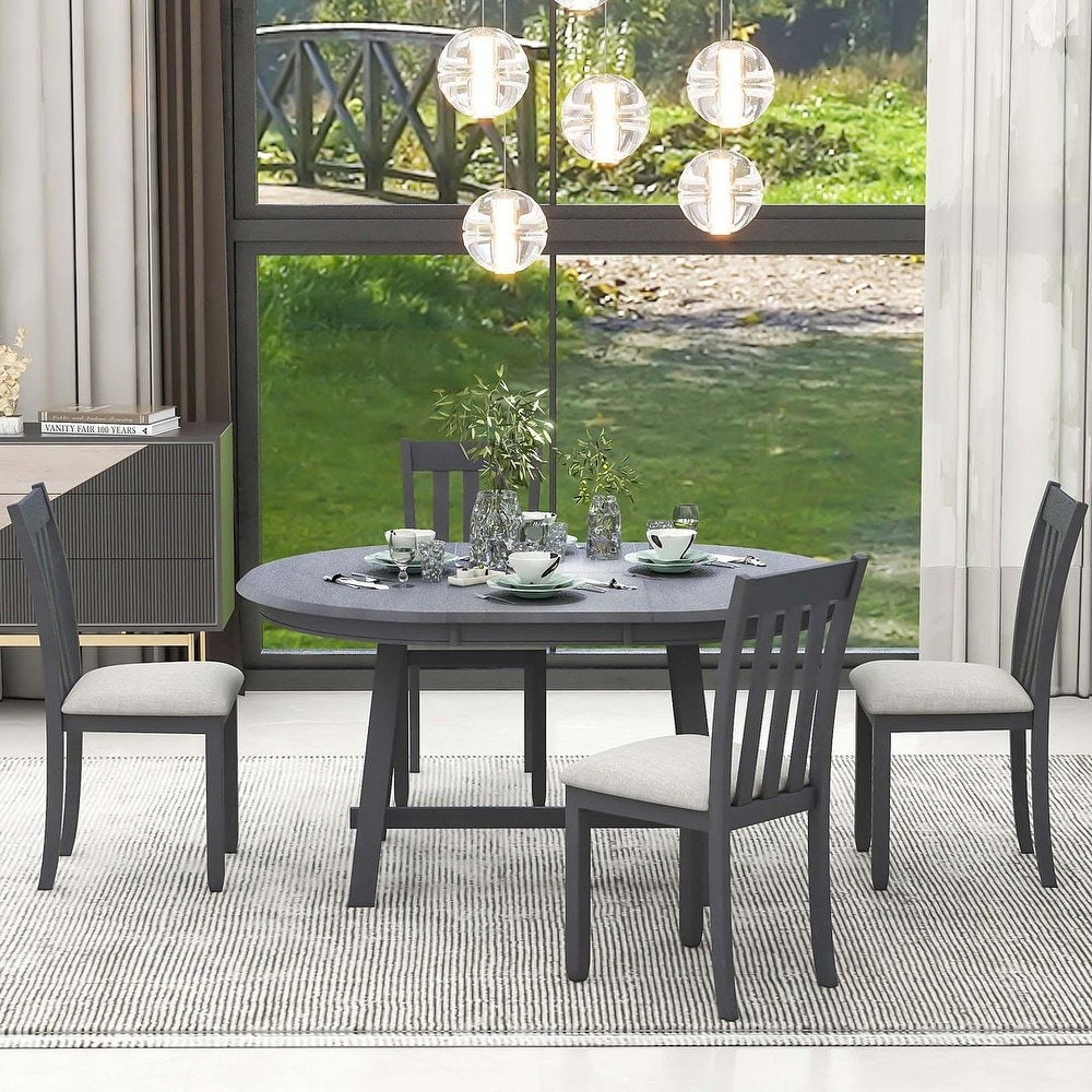 Expandable round dining table set for 4