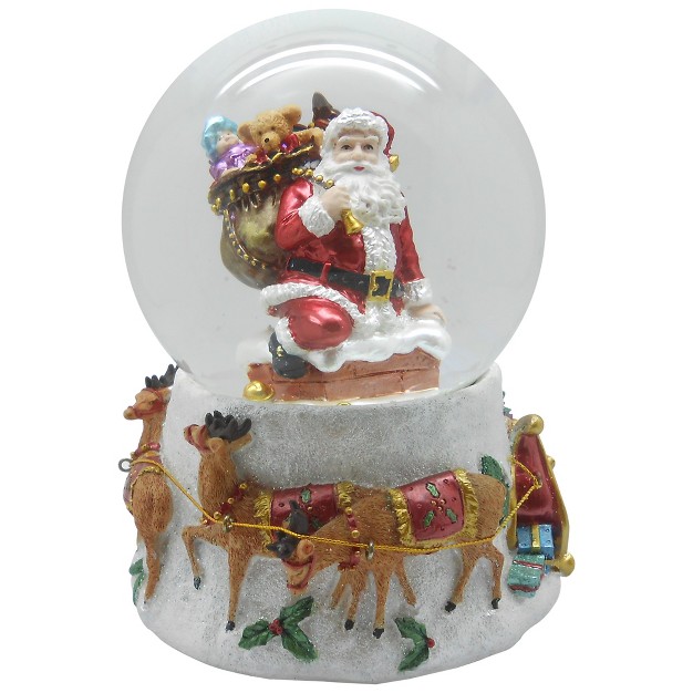 Santa Going Down The Chimney Musical Christmas Snow Globe