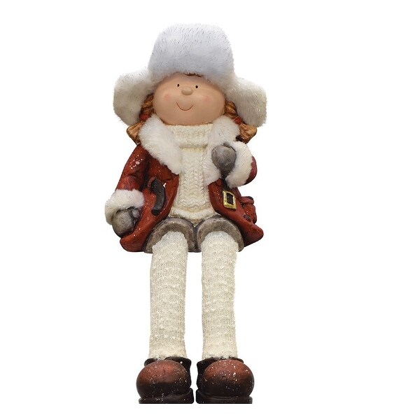 Sitting Young Girl in Trapper Hat Christmas Figurine