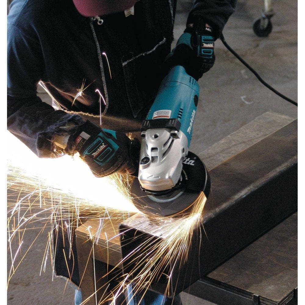 Makita 15 Amp 7 in. Corded Angle Grinder with Grinding wheel, Side handle and Wheel Guard GA7021