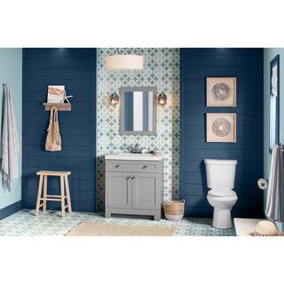 Glacier Bay 2-piece 1.1 GPF1.6 GPF High Efficiency Dual Flush Complete Elongated Toilet in White Seat Included N2316