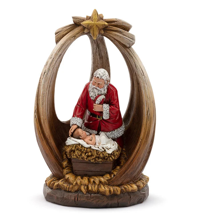 12 Santa With Baby Jesus In Crech