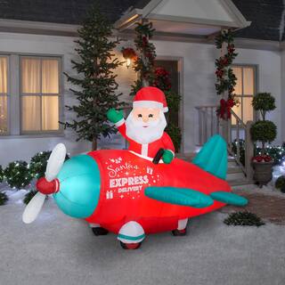 5 ft. Tall x 7 ft. W Christmas Inflatable Animated Airblown-Santa in Vintage Plane Scene G-882498