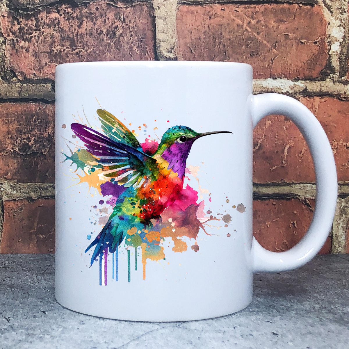 Hummingbird Watercolor Cup Grubby Garb 11 fl. oz. Novelty Ceramic Coffee Mug. This is the fifth of six hummingbird designs available. This is a beautiful gift idea for someone special in your life.