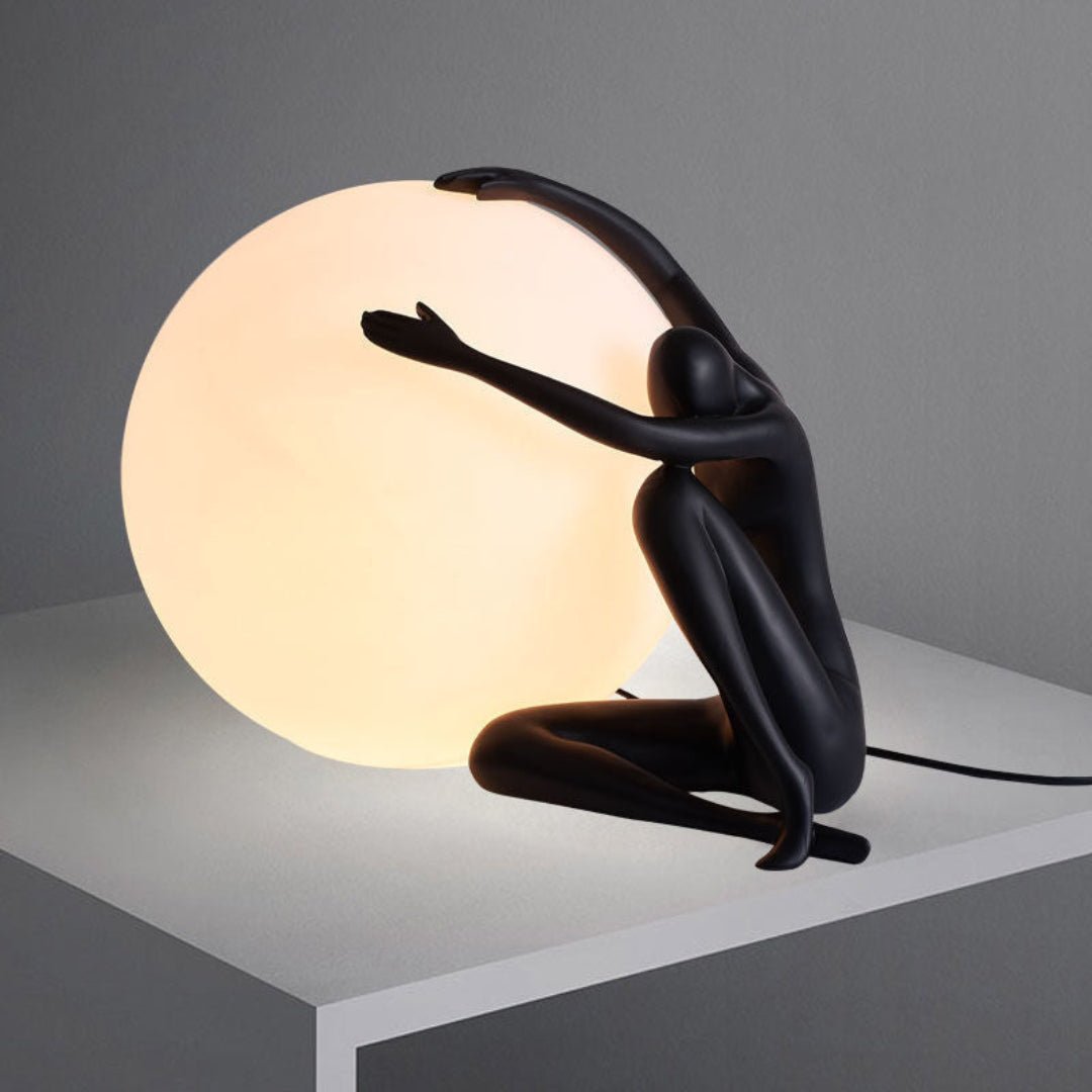 Humanoid Ball Holding Table Lamp