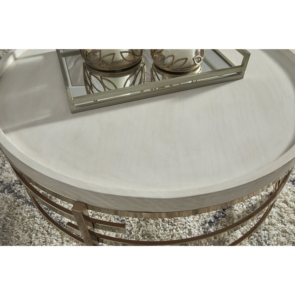 Montiflyn Round Cocktail Table - 38