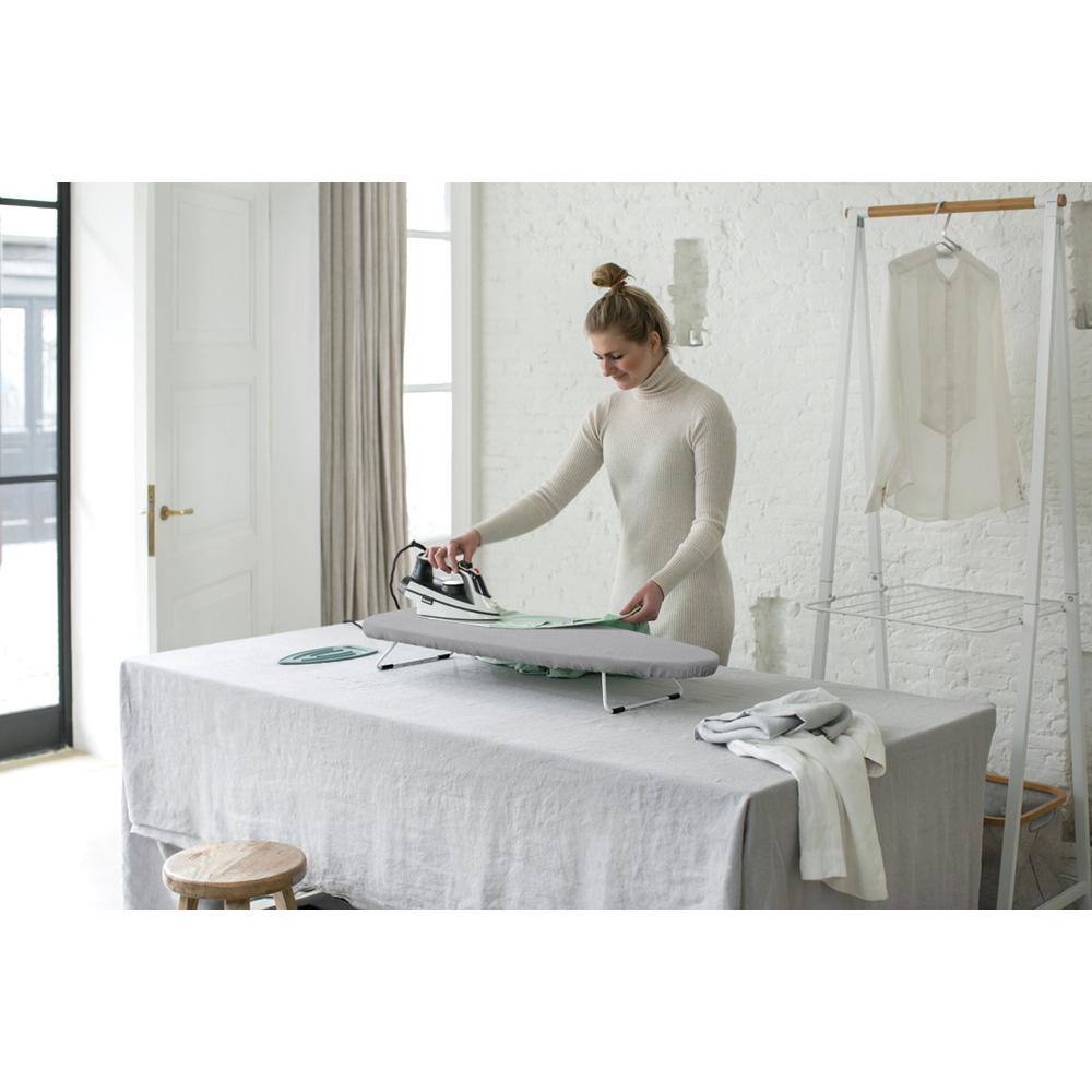 Brabantia Tabletop Ironing Board S 37 x 12 in with Collapsable Legs and Storage Hook with Metalized Cover and Black Frame 127663