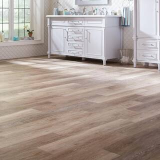 TrafficMaster Khaki Oak 4 MIL x 6 in. W x 36 in. L Grip Strip Water Resistant Luxury Vinyl Plank Flooring (480 sqftpallet) 300185312