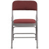 Flash Furniture HERCULES Series Curved Triple Braced & Double Hinged Burgundy Patterned Fabric Metal Folding Chair