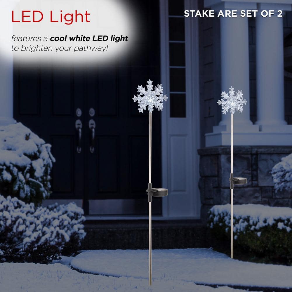 Alpine Corporation 33 in. Tall White Solar Snowflake Garden Stake with Cool LED Light (Set of 2) SLC131SLR-WT-2