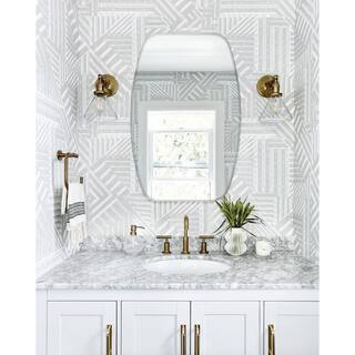 Decor Wonderland 24 in. W x 32 in. H Frameless Oval Beveled Edge Bathroom Vanity Mirror in Silver DWSM208