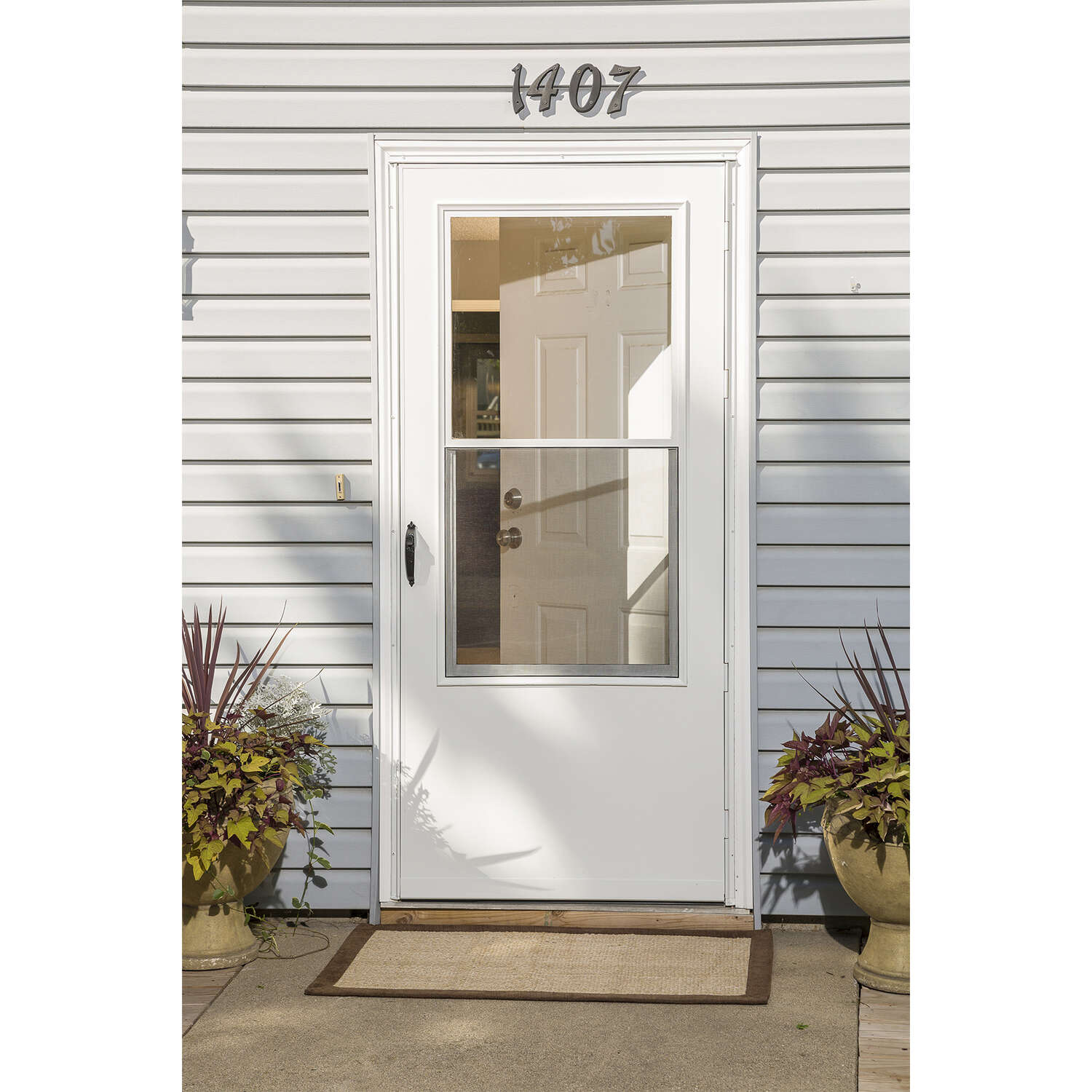 Larson 81 in. H X 32 in. W Vinyl/Wood White Mid-View Reversible Self-Storing Storm Door