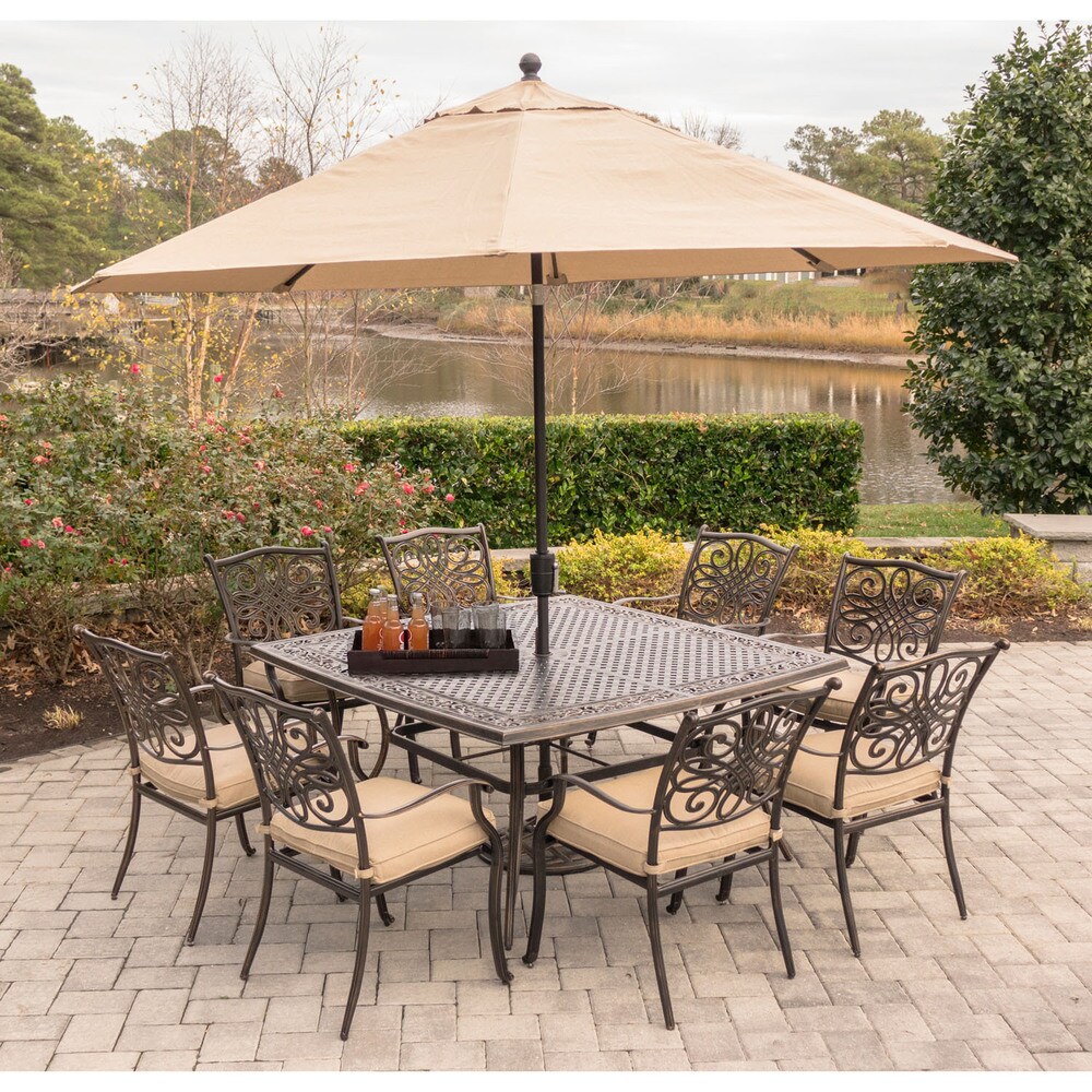 Hanover Traditions 9 Piece Dining Set in Tan with Square 60 In. Cast Top Dining Table  11 Ft. Table Umbrella  and Umbrella Base