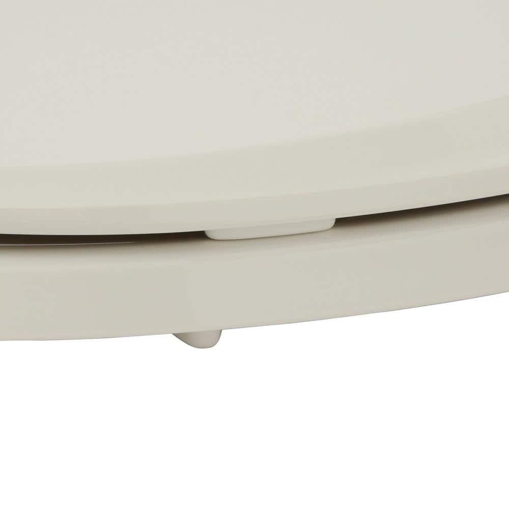 KOHLER GripTight Cachet Q3 Elongated Closed Front Toilet Seat in Biscuit