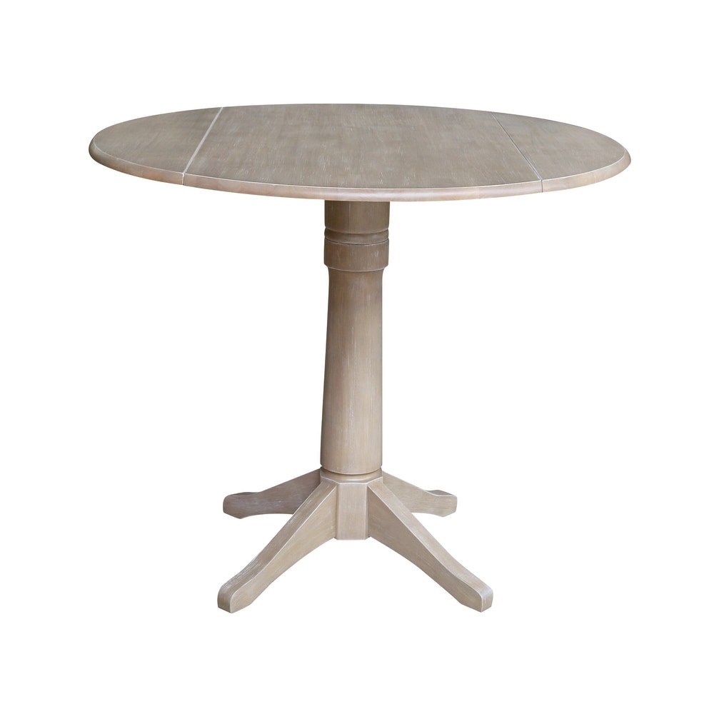 42 in. Round Top Dual Drop Leaf Pedestal Dining Table