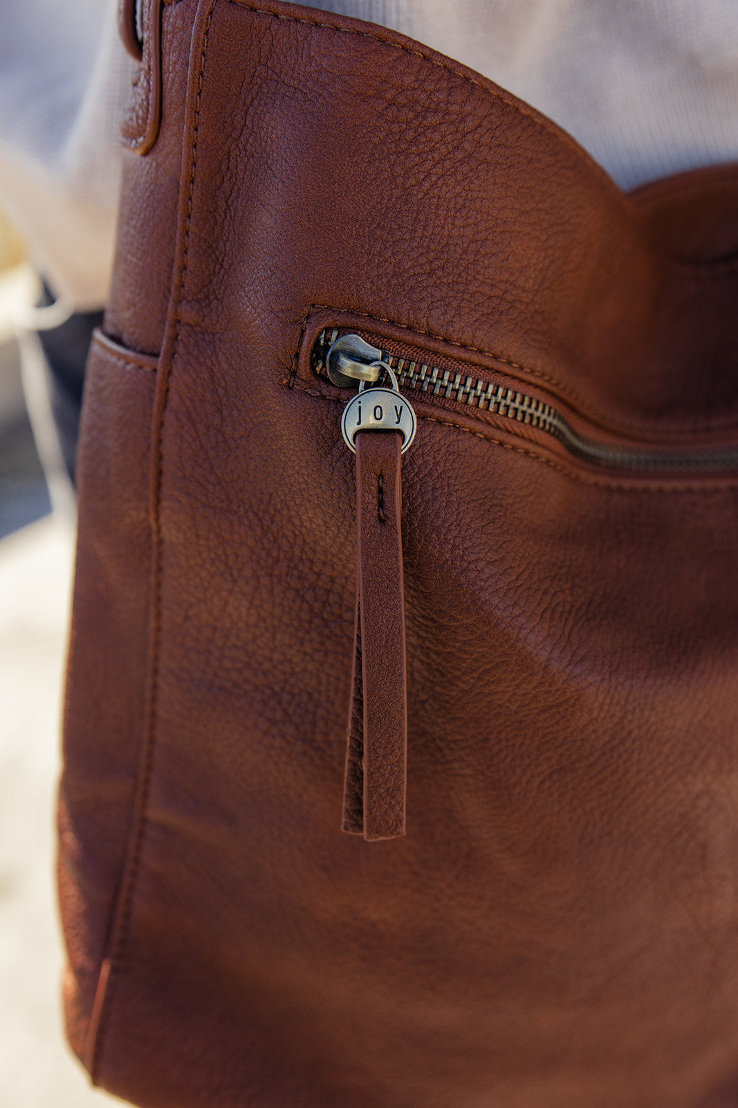 Bindi Front Slip Pocket Bucket Crossbody Bag