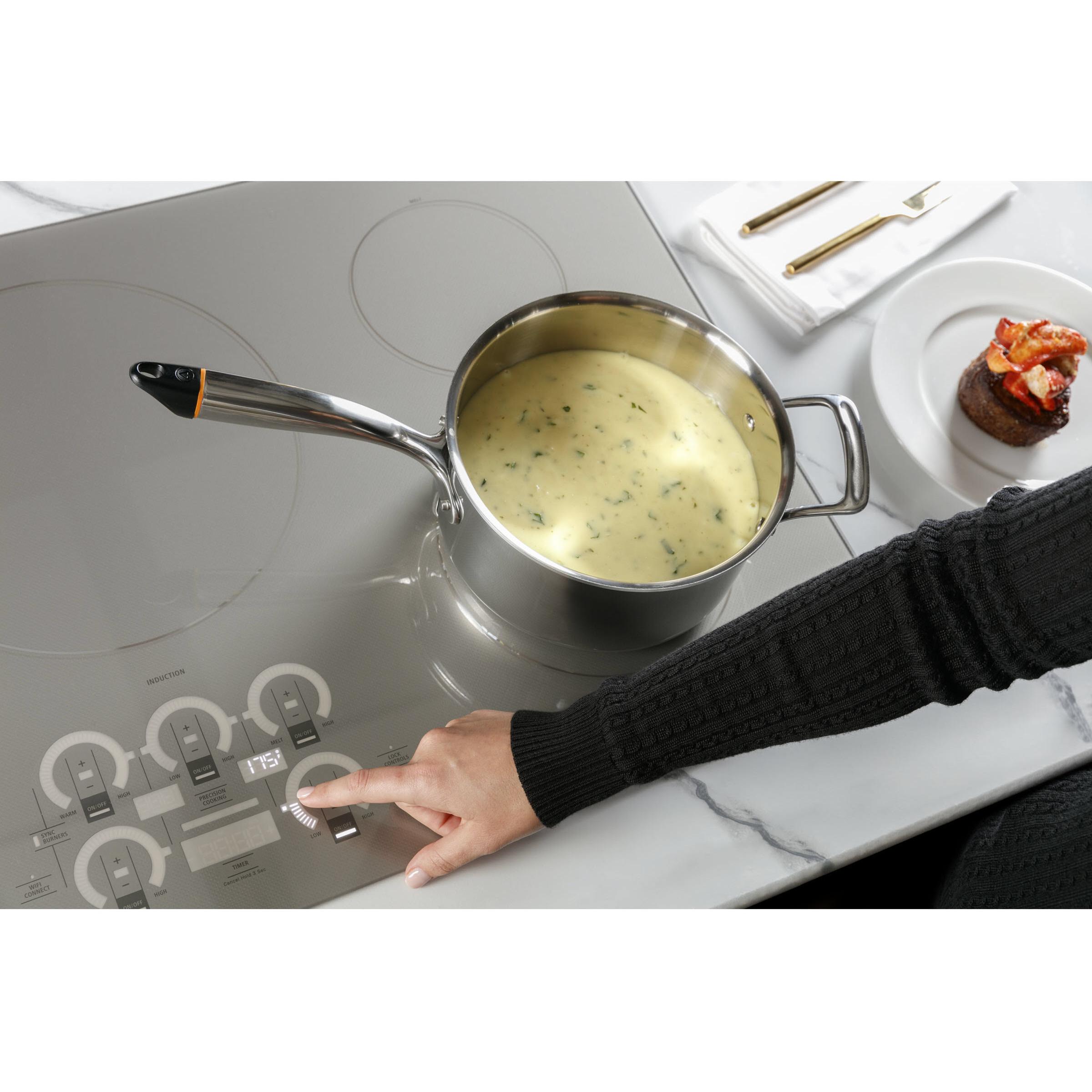 Monogram 36-inch Built-in Induction Cooktop with Wi-Fi Connect ZHU36RSTSS