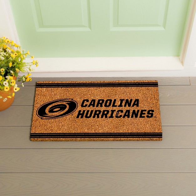 Evergreen Carolina Hurricanes Logo Turf Mat Brown 28 X 16 Inches Indoor Outdoor Doormat