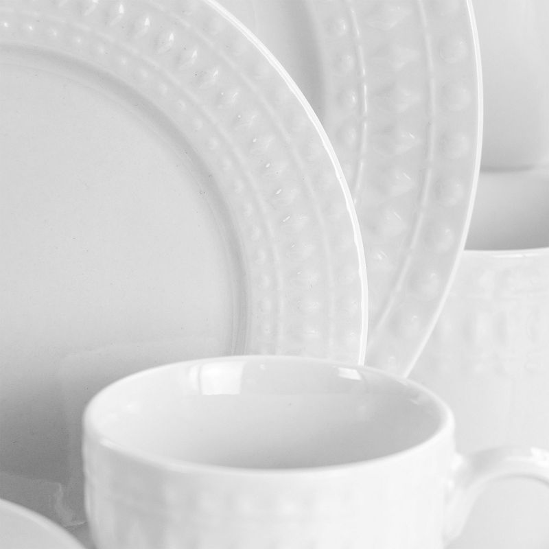 Elama Cara 16 Piece Round Porcelain Dinnerware Set in White