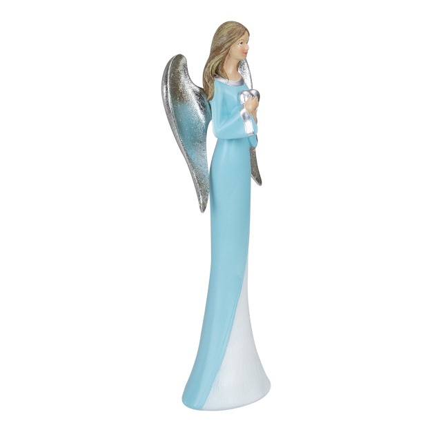 Blue And White Angel Figure Holding A Heart