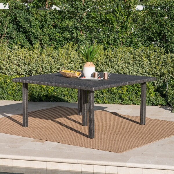 Outdoor 64 Inch Square Dining Table with Wicker Pulled Over an Iron Frame