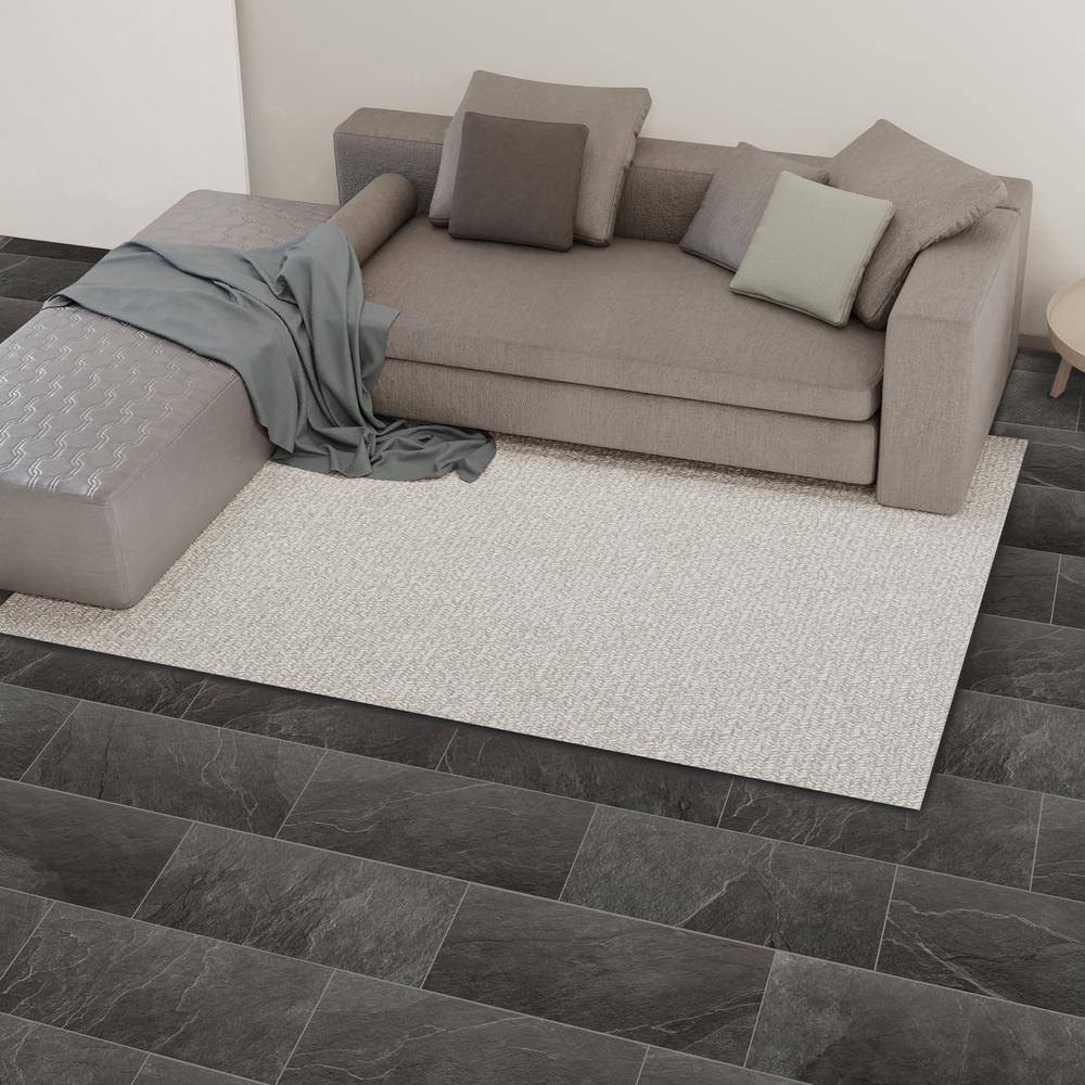 Florida Tile Home Collection Sediment Slate Black 12 in. x 24 in. Porcelain Floor and Wall Tile (13.62 sq. ft.Case) CHDESDS1012X24