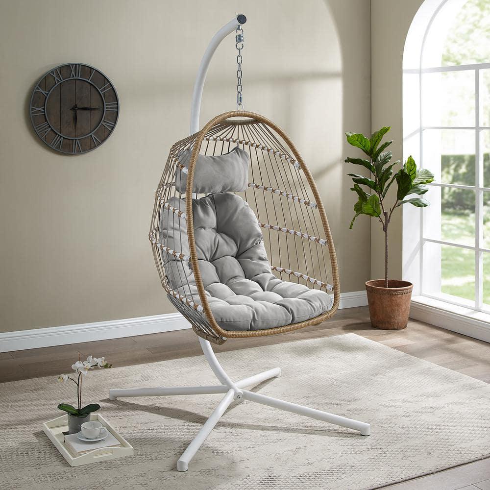 Welwick Designs 1Person Brown Rattan Patio Swing Egg Chair with White Stand and Gray Cushions