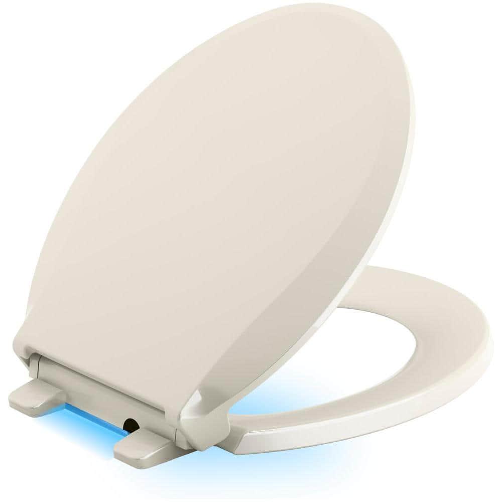 KOHLER Cachet LED Nightlight Round Quiet Closed Front Toilet Seat in Biscuit