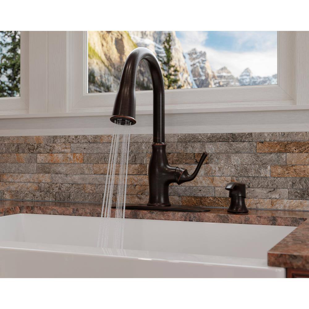 Pfister Rosslyn Single Handle Pull Down Sprayer Kitchen Faucet with Deckplate Included in Tuscan Bronze F-529-7RSSRY