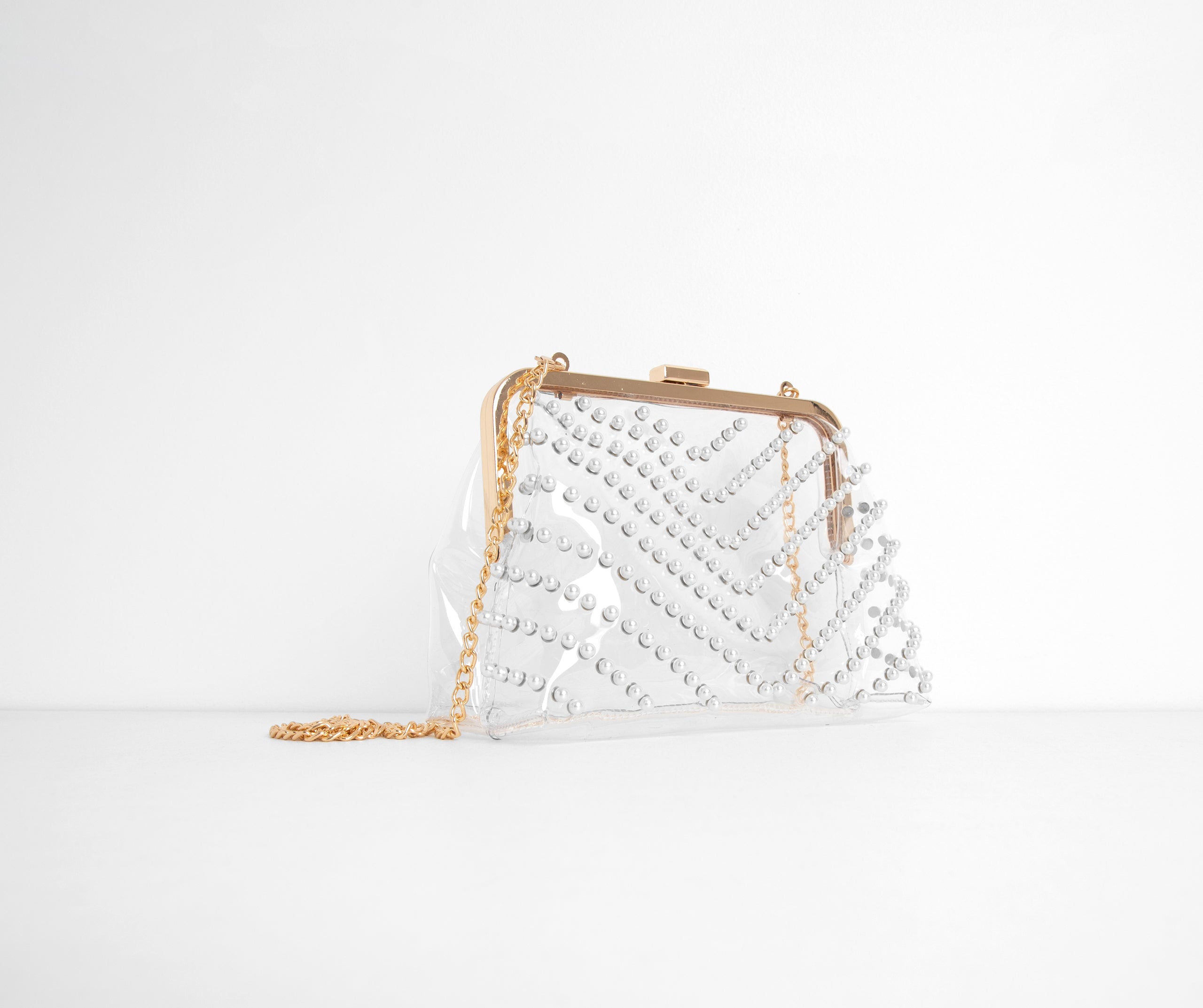 Give A Twirl Clear Pearl Clutch