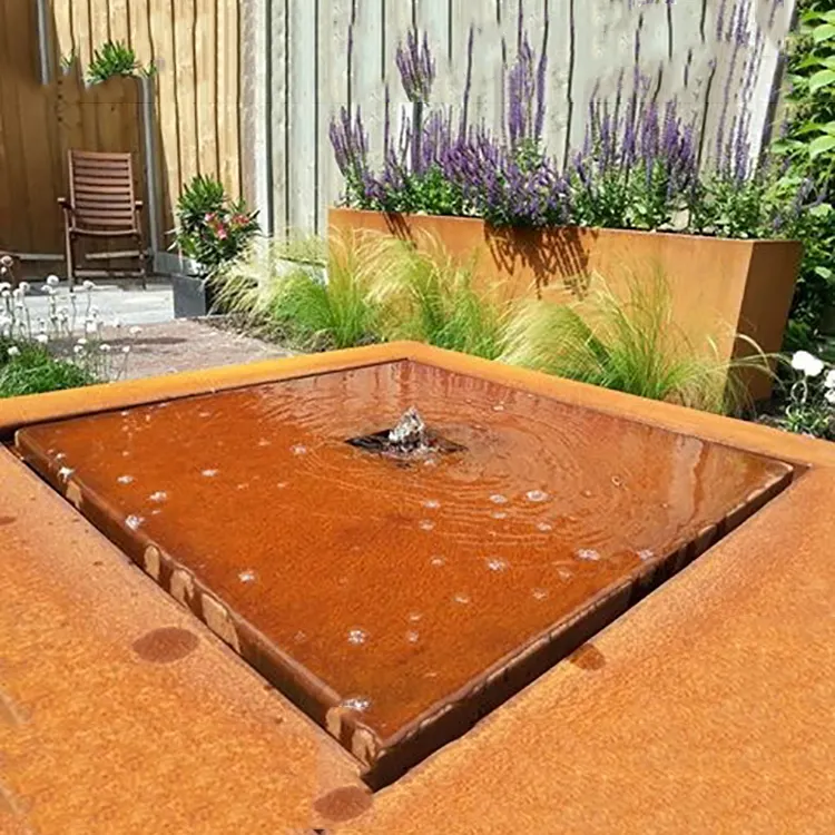 The garden is decorated with corten steel garden waterfalls of different shapes