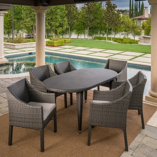 Benjamin Outdoor 7piece Oval Wicker Dining Set with Cushions by Christopher Knight Home