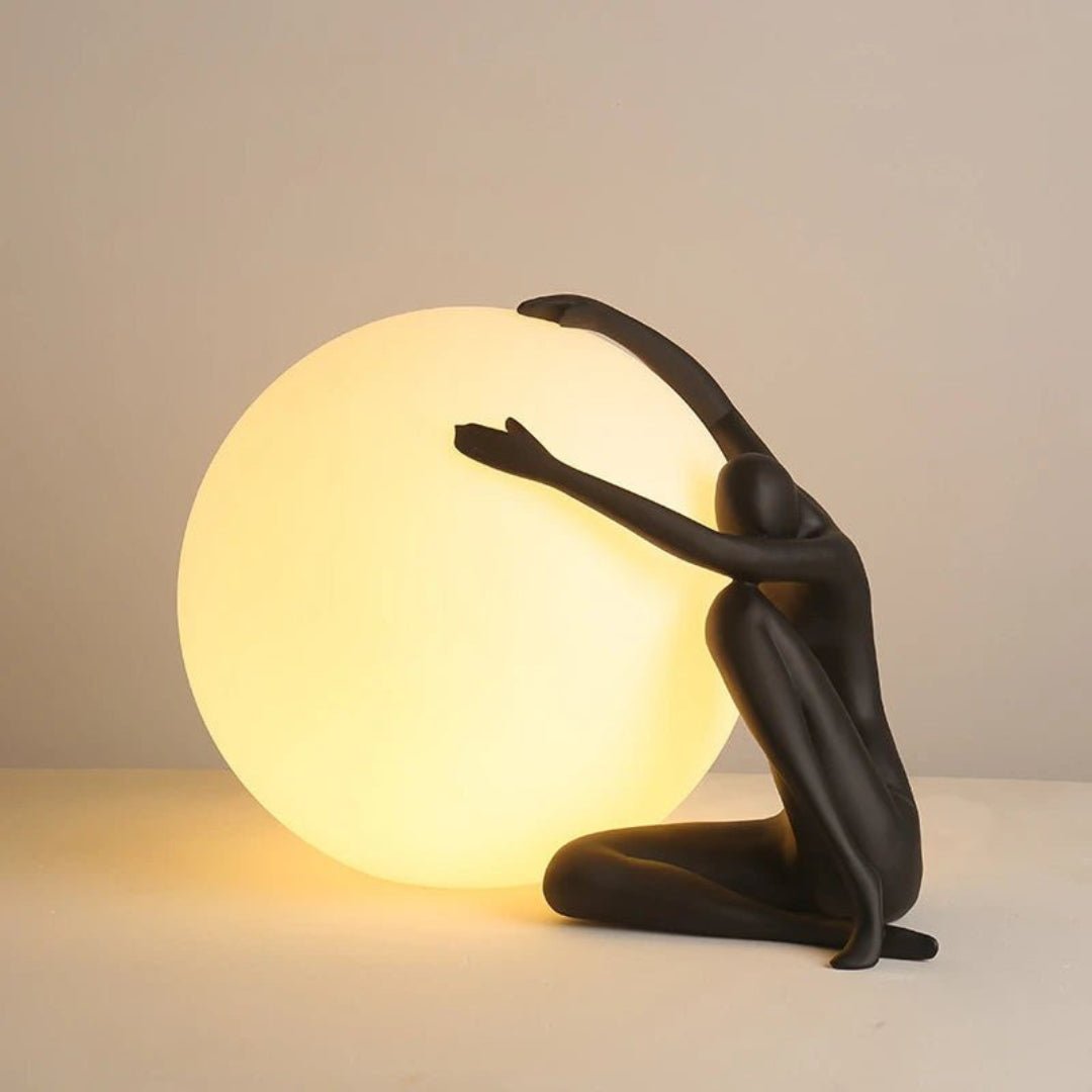 Humanoid Ball Holding Table Lamp