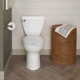 American Standard Cadet 3 Tall Height 10 in. Rough-In 2-piece 1.28 GPF Single Flush Elongated Toilet in White Seat Included 3378AB128ST.020