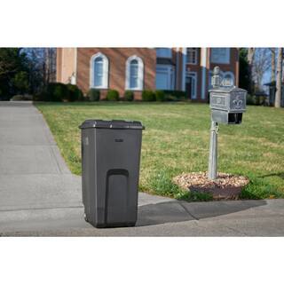 Rubbermaid Roughneck 45 Gal. Black Wheeled Vented Trash Can with Lid 2136425