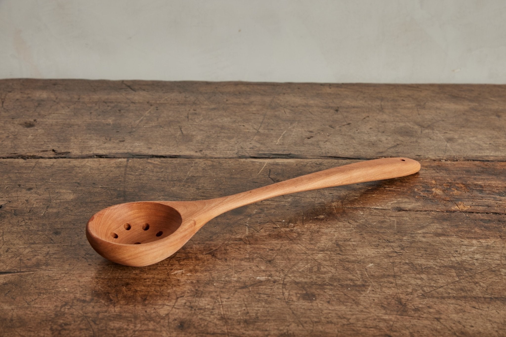 Cherry Wood Rounded Slotted Spoon