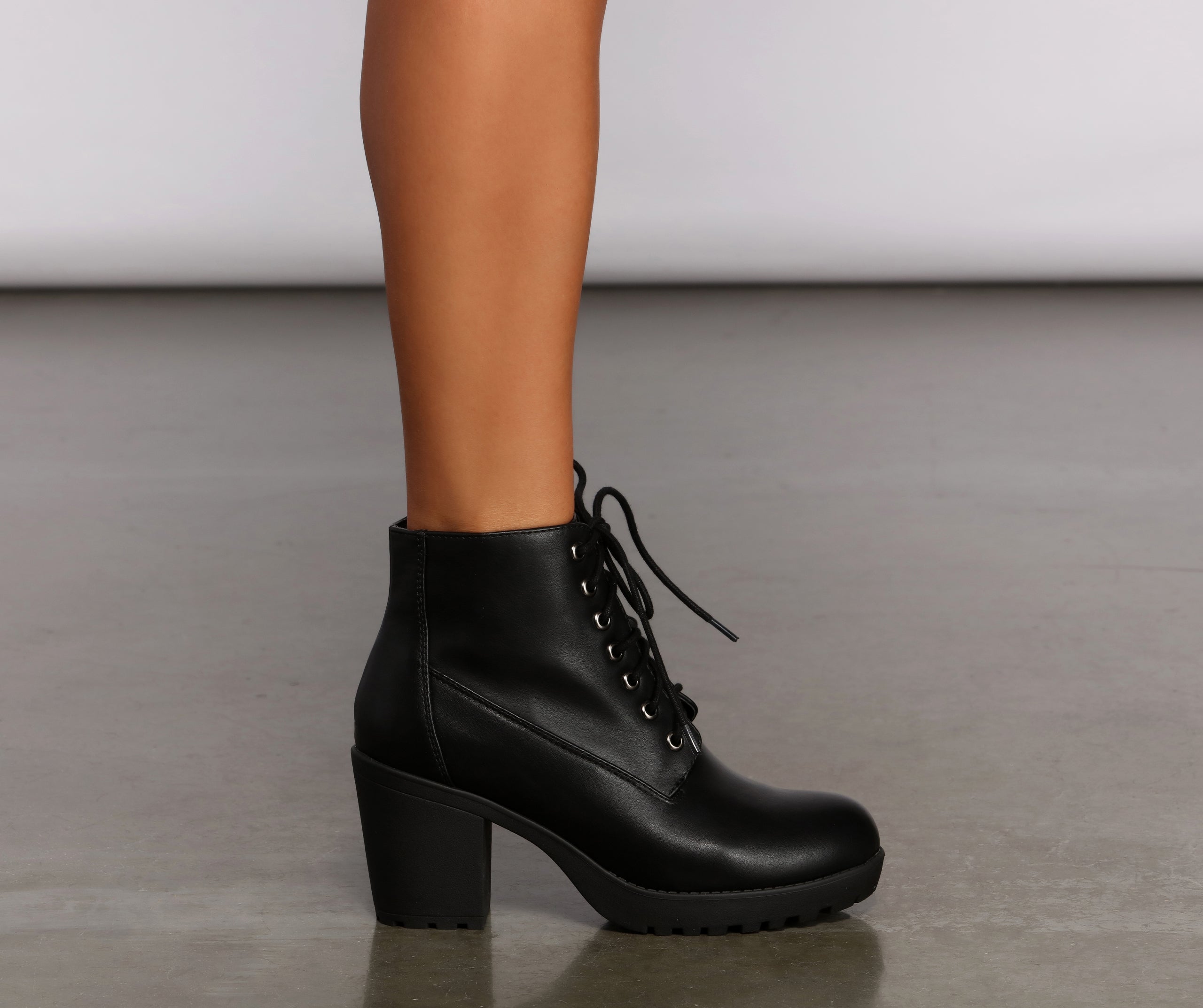 Stepping Up Faux Leather Lug Booties