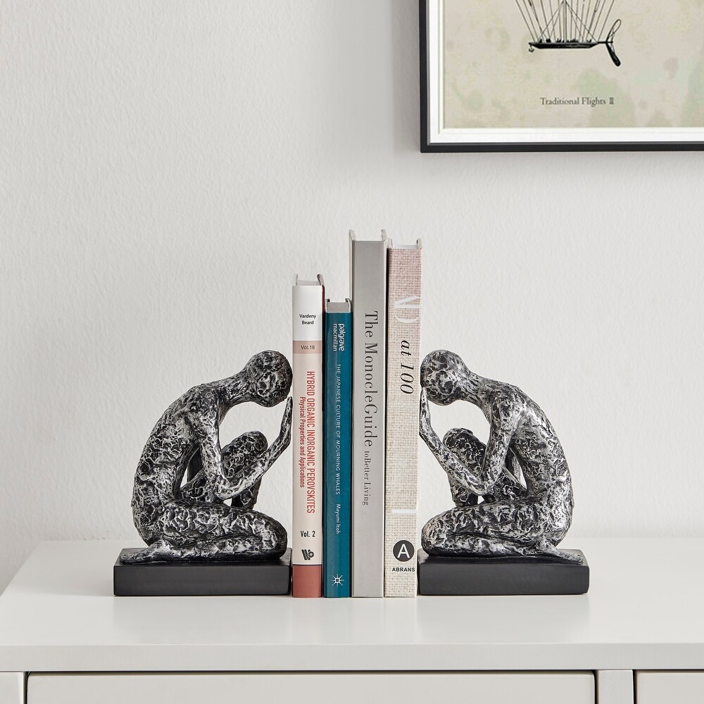 Danya B. Kneeling Figure Sculptures Polyresin Silver and Black Finish Bookend Set of 2