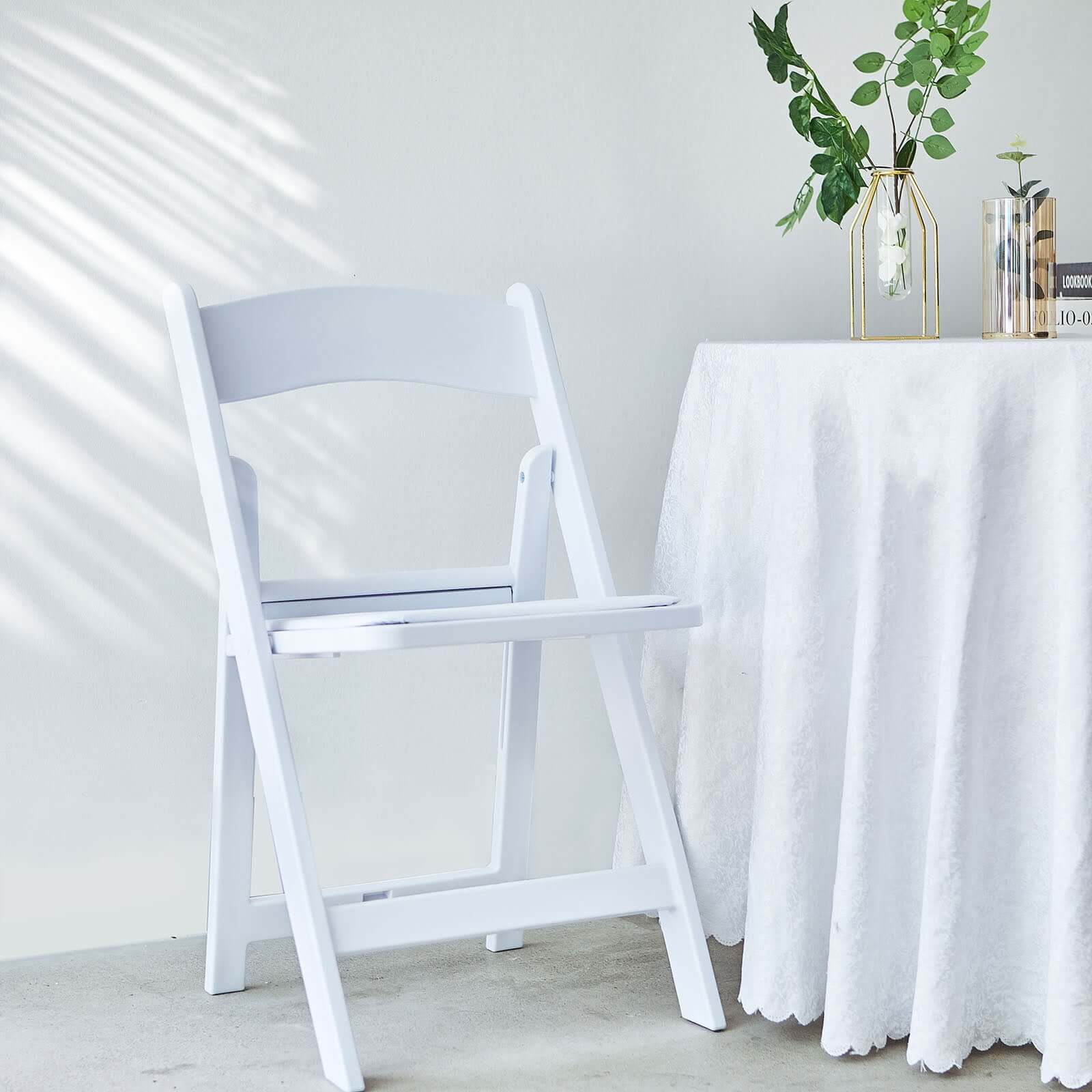 White Resin Folding Chair With Vinyl Padded Seat For Weddings, Indoor or Outdoor Events