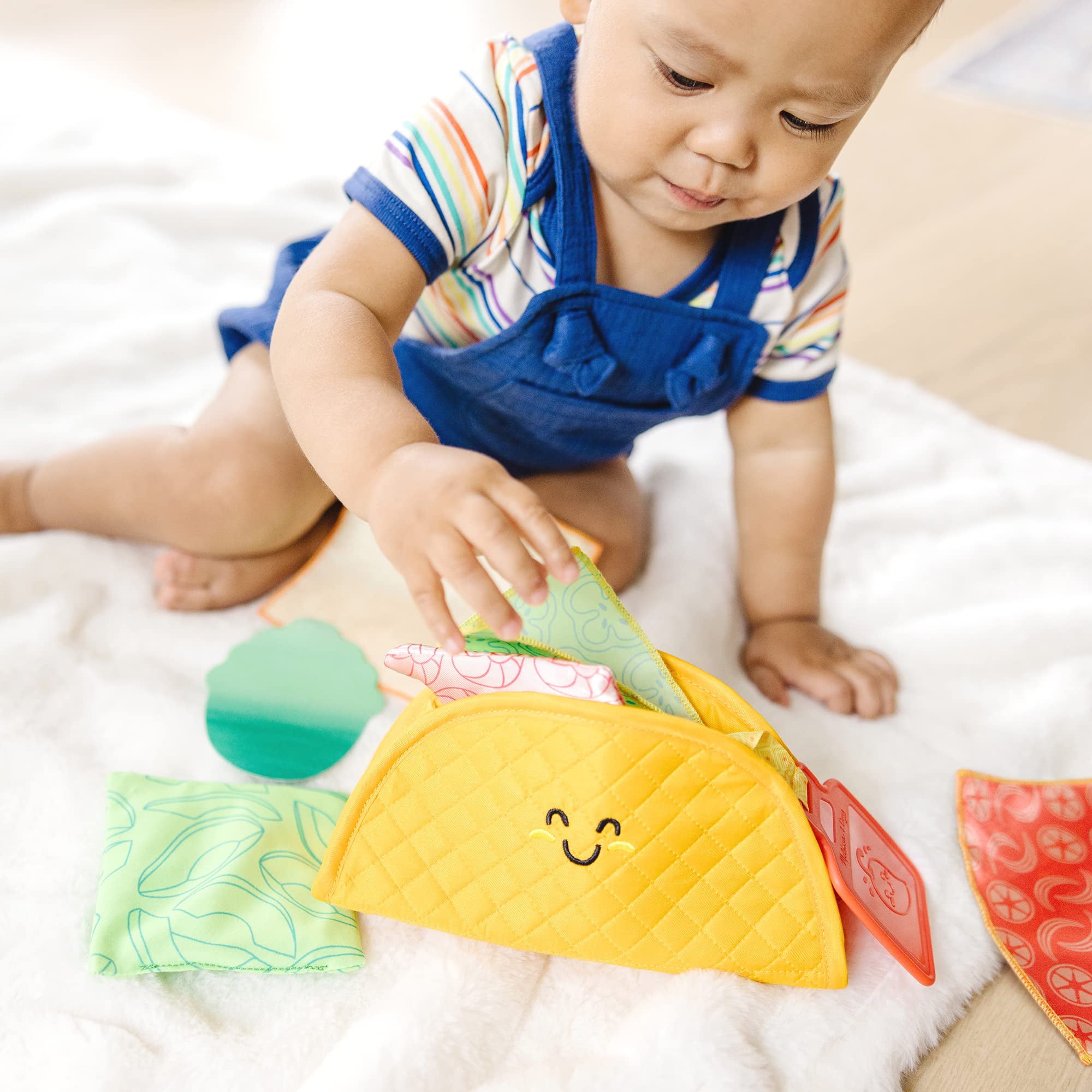 Melissa and Doug Multi-Sensory Soft Taco Fill and Spill Infant Toy