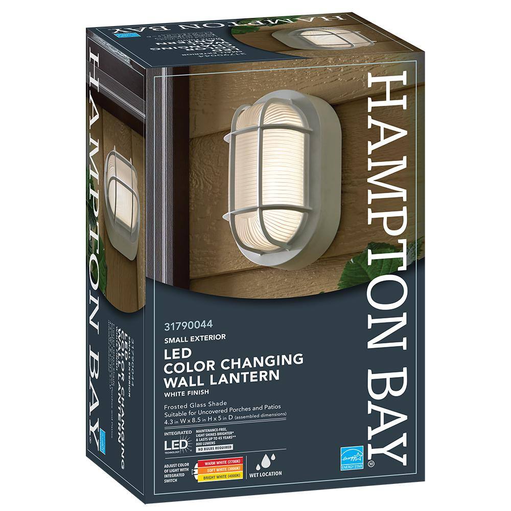 Hampton Bay 8.5 in. Oval White LED Outdoor Wall Ceiling Bulkhead Light 3 Color Temperature Options Weather Rust Resistant 800 Lumen 504071010