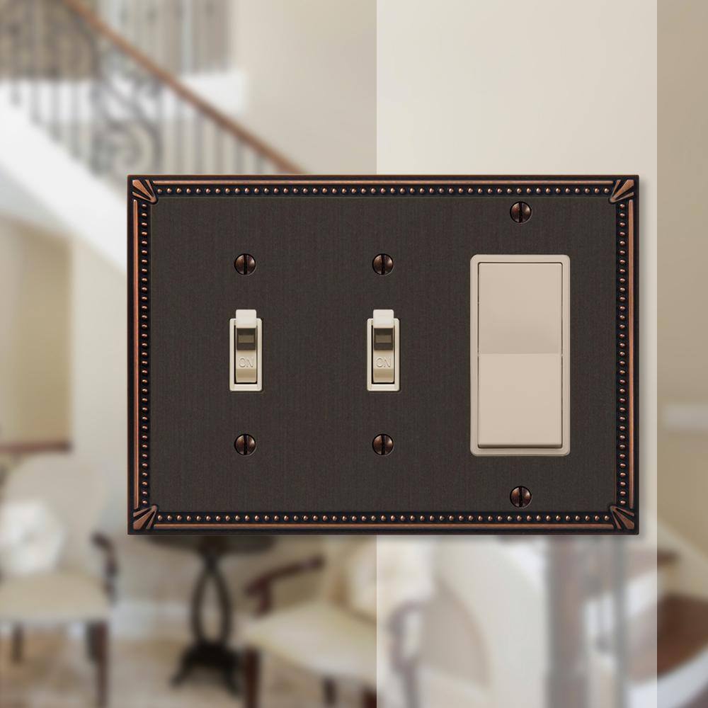 AMERELLE Imperial Bead 3 Gang 2-Toggle and 1-Rocker Metal Wall Plate - Aged Bronze 74TTRDB